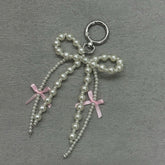 Korean Pearl Bow Phone Charm – Stylish & Feminine